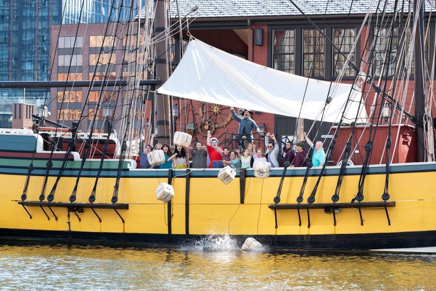 Boston: Boston Tea Party Ships and Museum Interactive Tour - Throwing tea from the replica ships