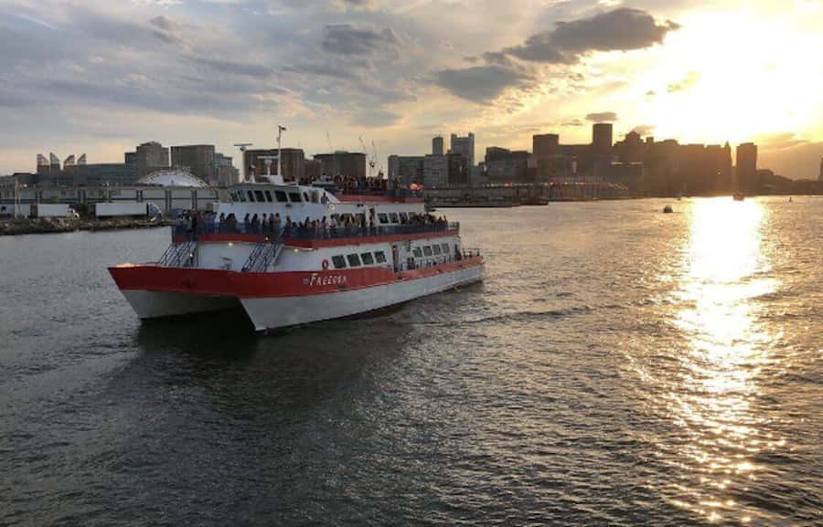 Boston Harbor: Full Moon Cruise with Champagne Option - Logan Airport adds sound and spectacle