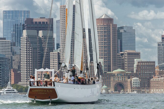 Boston Harbor Sunset Sail Tour - Leaving Rowes Wharf as Boston turns golden