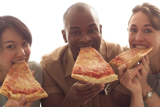 Boston Pizza Lovers Food and History Walking Food Tour - Walking the North End with pizza in hand
