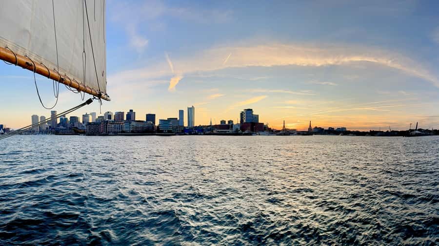 Boston: Sunset Tall Ship Harbor Cruise - Raising the sails with the Liberty Fleet crew